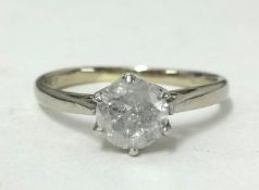 A white gold diamond solitaire ring, approx 1/2 carat, finger size J 1/2.