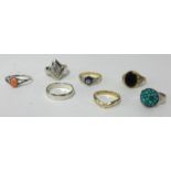 Seven assorted dress rings.