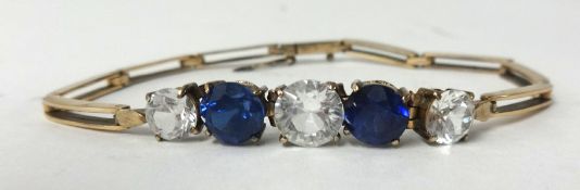 A bracelet set with faux diamonds and sapphires.