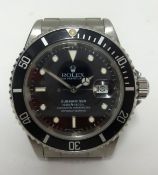 Rolex, a gents Oyster Perpetual Date Submariner, stainless steel wristwatch with black dial and