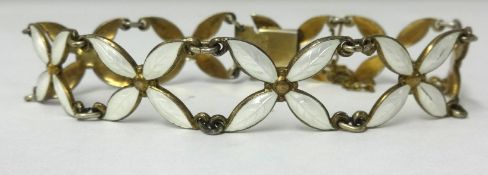 A John Baalerud contemporary bracelet of flower head design.