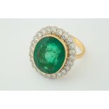 A fine and large emerald and diamond cluster ring, approx emerald weight 13.84ct, approx diamond