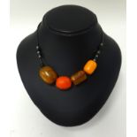 An East African amber bead necklace (Masai Ethoria).