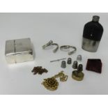 A cigarette box, hip flask and various items.