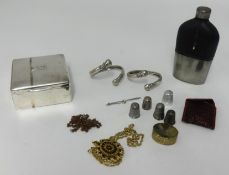 A cigarette box, hip flask and various items.
