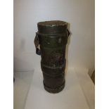 Composition cylindrical bucket, green with worn transfer of Royal Coat of Arms, leather handle,