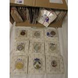 A large selection of uncirculated commemorative coins (mostly of one dollar denominations)