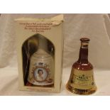 House of Bell's specially selected Scotch whisky Wade porcelain decanter to commemorate the 60th