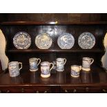 Five 19th century blue and white transfer decorated quart tankards, a similar mug and four