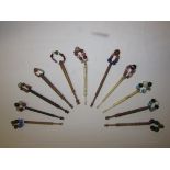 Three bone lace bobbins with beads (one drilled GEORGE) and eight wooden lace bobbins (all but one
