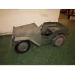 Model pedal car formed as a jeep, green, steering wheel absent and requiring restoration, overall