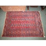 Russian Bokhara rug, red ground, twenty-two medallion within rectangle (166cm x 122cm)