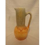 A Beswick ware pottery ewer in a grey glaze graduating to ochre at the base, height 26cm, stamped '