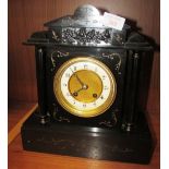 BLACK SLATE CHIMING MANTLE CLOCK WITH DECORATIVE MOULDING AND BRASS AND ENAMEL DIAL (KEY IN OFFICE)