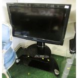 PANASONIC VIERA 32" DIGITAL LCD TV ON SMOKED GLASS STAND (REMOTE IN OFFICE)