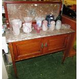 MAHOGANY VENEERED AND INLAID MARBLE TOP WASH STAND WITH TWO DOORS, ON LEGS WITH CASTORS