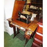 SINGER CAST METAL AND OAK SEWING TABLE WITH SEWING MACHINE AND CONTENTS OF SMALL ACCESSORIES