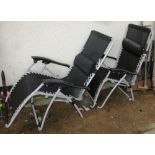 TWO FOLDING PATIO CHAIRS WITH BLACK MESH SEATS