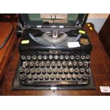 EARLY 20TH CENTURY IMPERIAL 'THE GOOD COMPANION' MODEL T TYPEWRITER IN HARD CARRY CASE WITH MANUAL