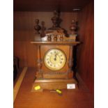 HAC GERMAN MADE WOODED CASED MANTLE CLOCK WITH ROMAN CHAPTER AND TURNED FINIALS (KEY IN OFFICE)