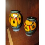 TWO POOLE POTTERY DECORATIVE VASES (A/F)