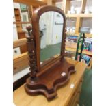 MAHOGANY VENEERED SWING MIRROR WITH SHAPED BASE AND TURNED SUPPORTS