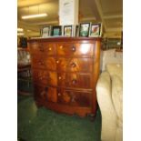 MAHOGANY VENEERED BOW FRONTED CHEST OF TWO SHORT OVER THREE LONG DRAWERS WITH TURNED HANDLES