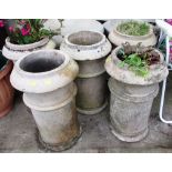 FIVE COMPOSITE STONE CHIMNEY POTS (THREE WITH CONTENTS)