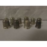 TEN SILVER THIMBLES - each with British assay marks for Birmingham, Chester and Sheffield, of