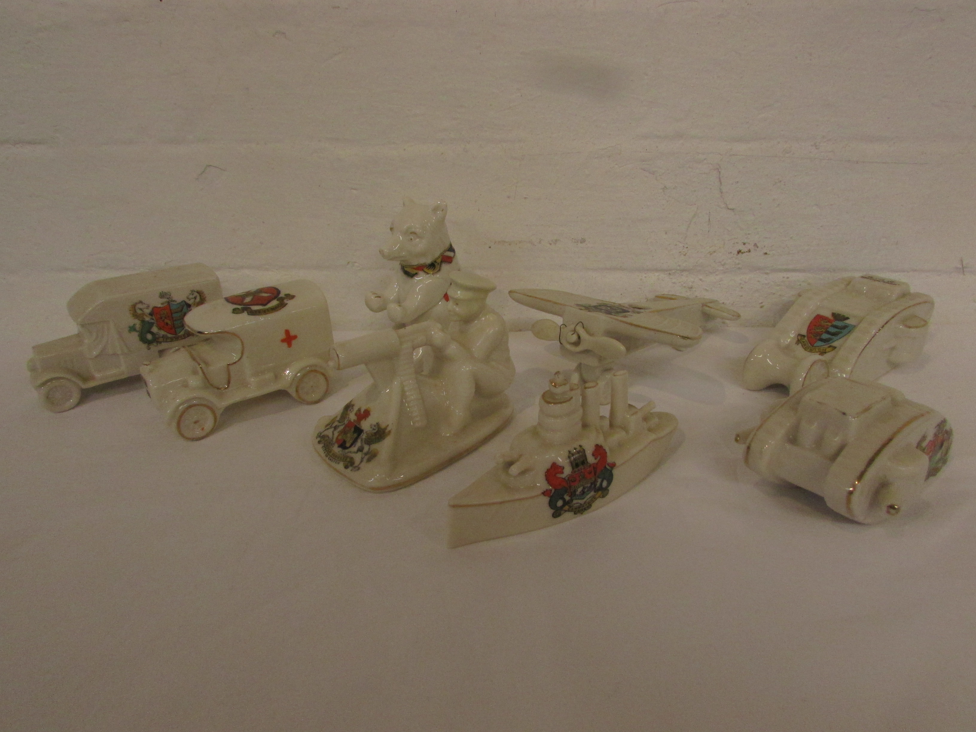 Eight WWI crested china figures - Coronet China seated bear marked 1914 European War, Arcadian Tommy