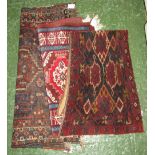 A far Eastern tent band reputedly woven by nomads (109cm x 46cm); a small modern rug on red and blue