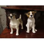 Two Winstanley dogs - a standing white and brown puppy with brown glass eyes, height 20cm, marked