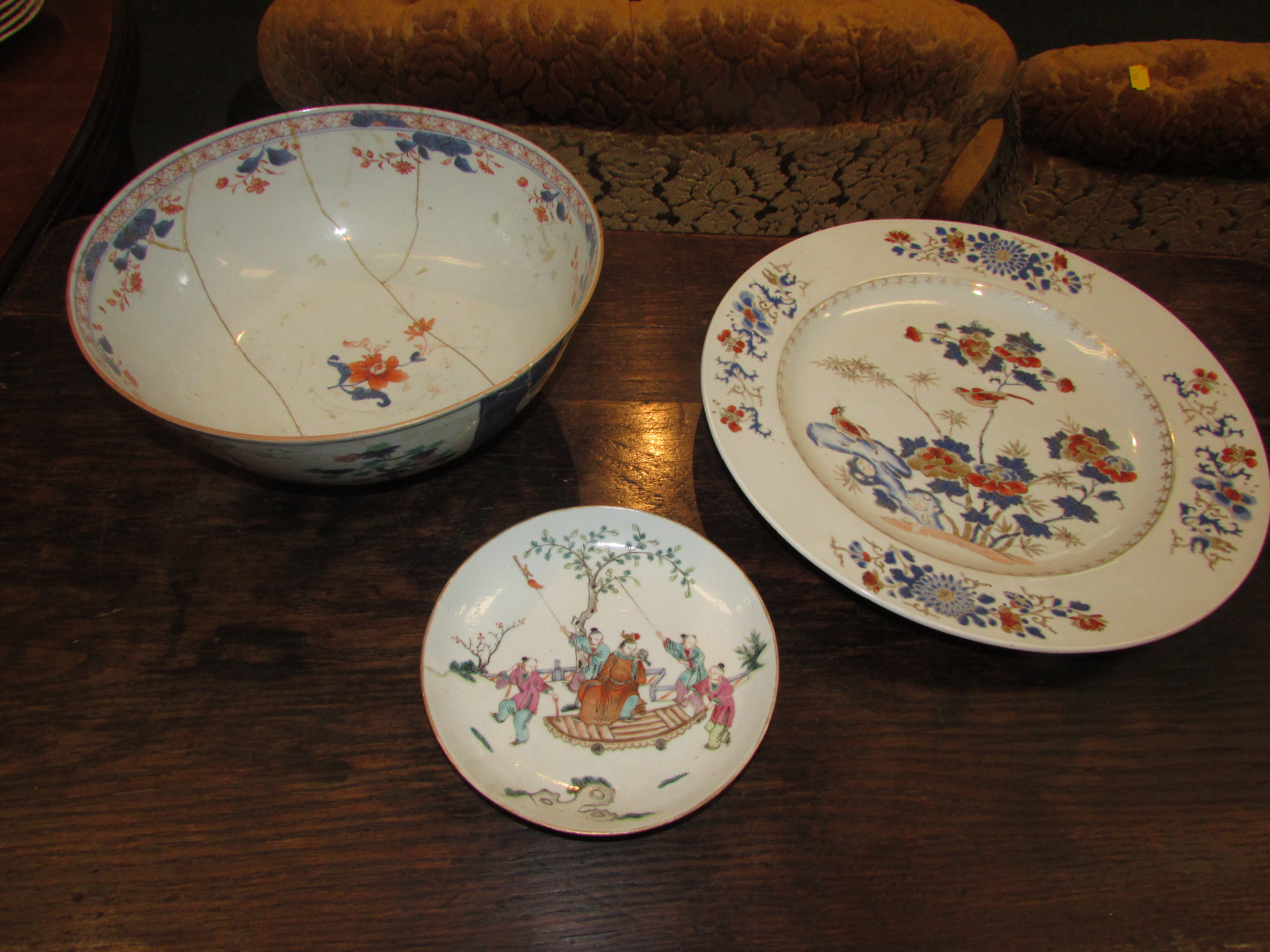 Three items of Chinese porcelain - a circular dish enamelled in blue and red with birds in flowering