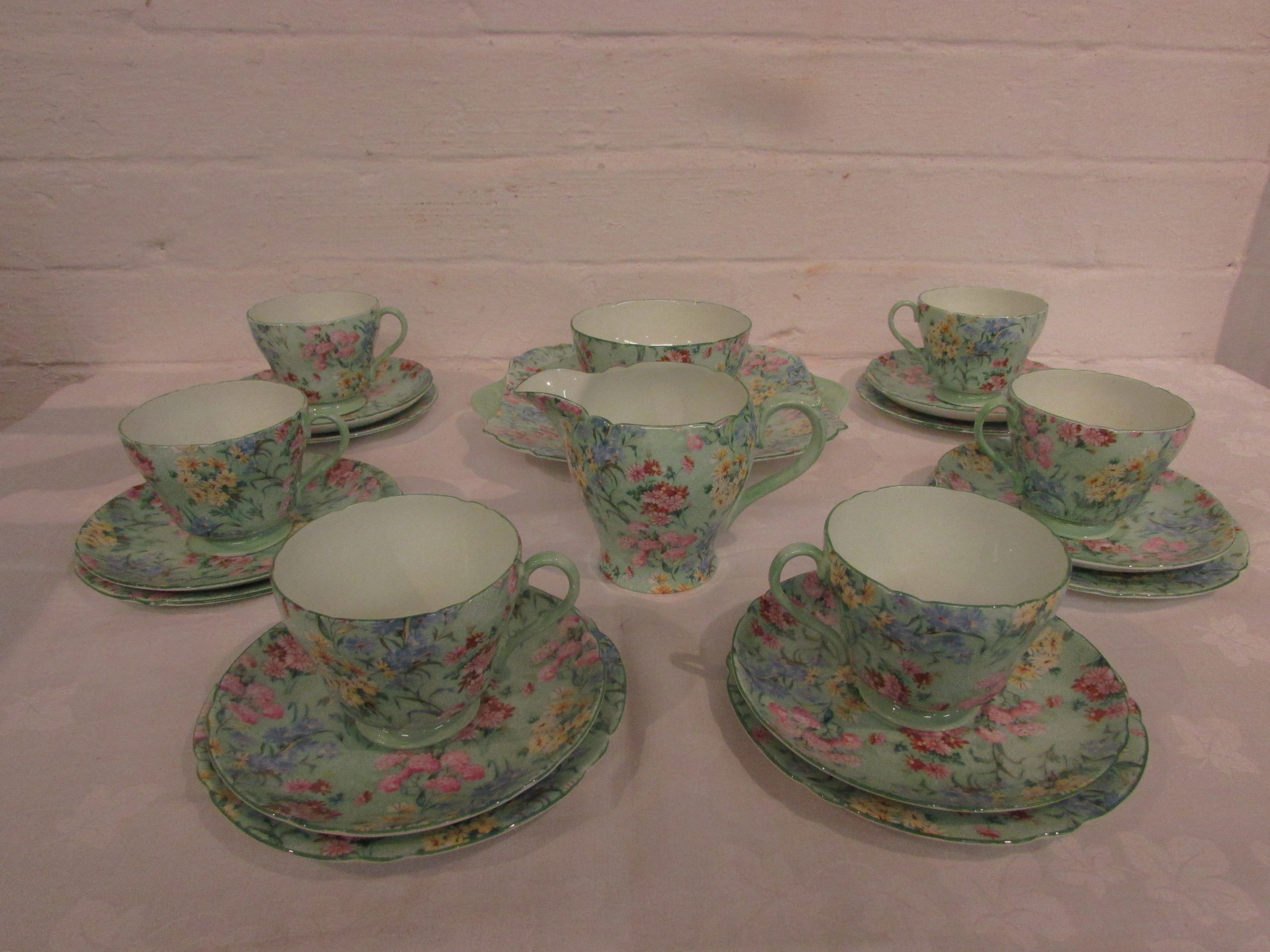 Shelley Melody tea set comprising six cups, saucers and side plates, a square serving plate, milk