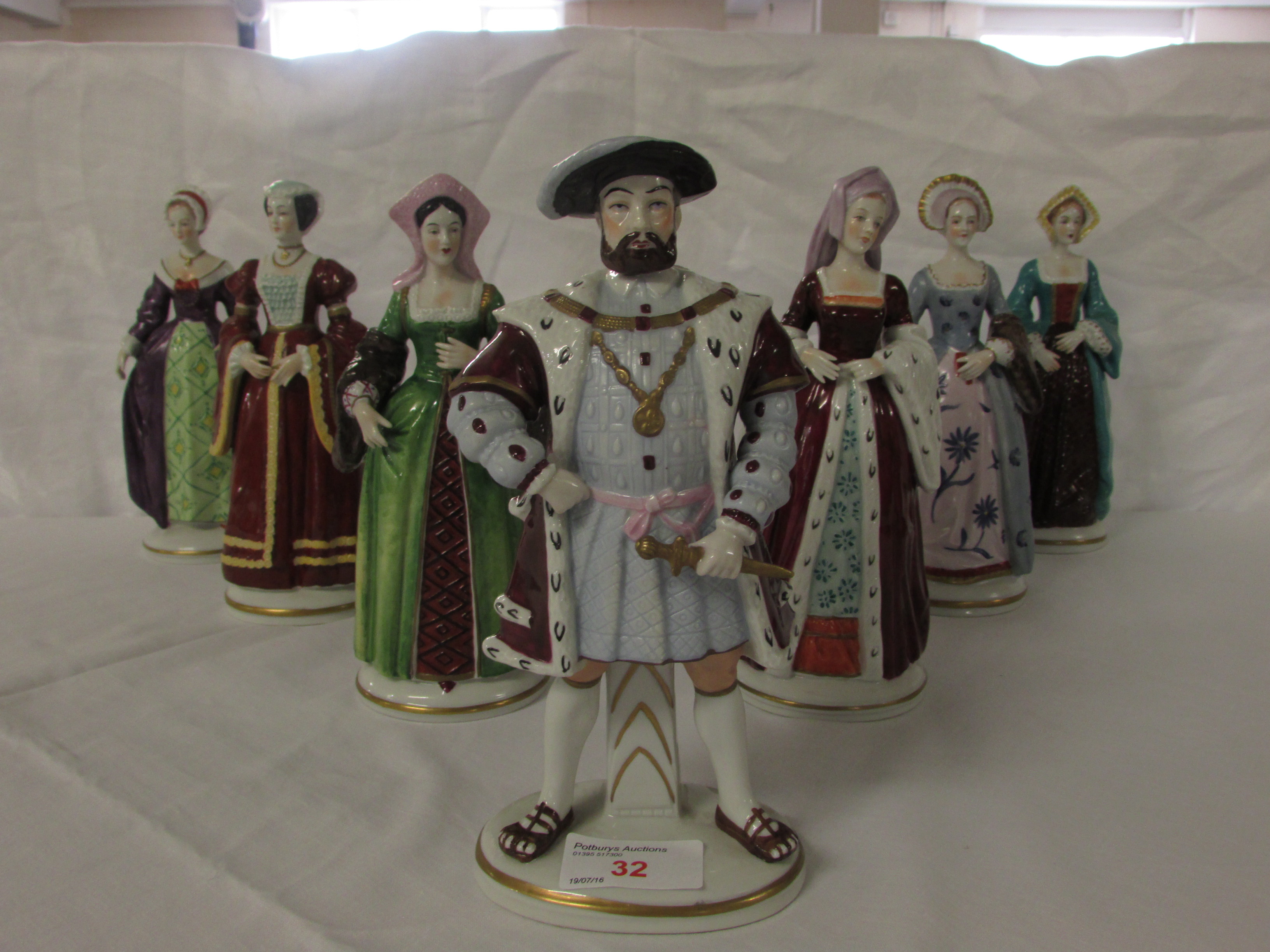 Set of Sitzendorf porcelain figures of Henry VIII and his six wives