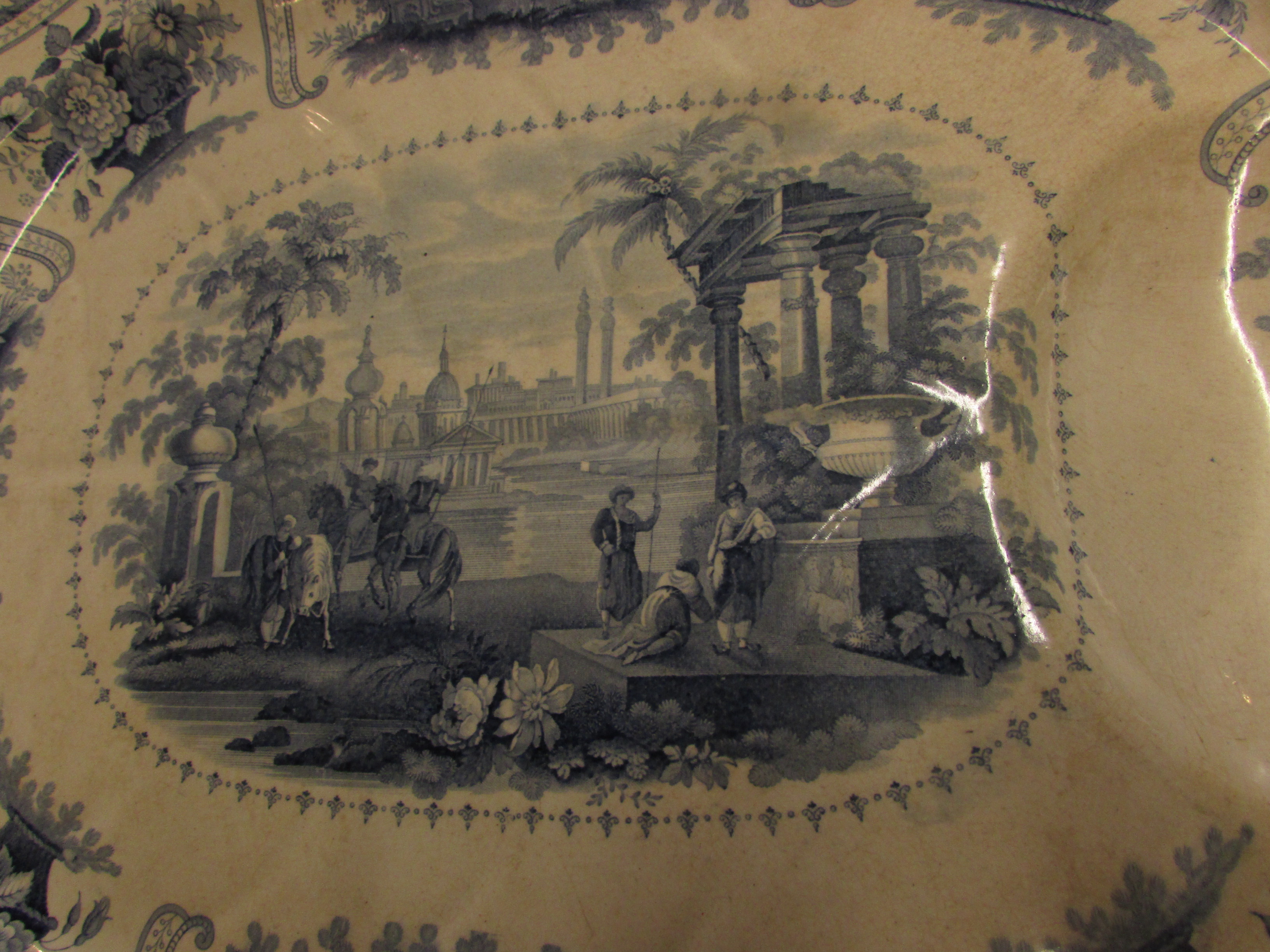 A large pottery meat or turkey plate, 19th century and transfer decorated in blue on white, the base - Image 2 of 5