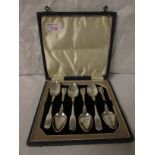 A cased set of six Georgian silver fiddle back teaspoons, terminals monogrammed D, date letter d,