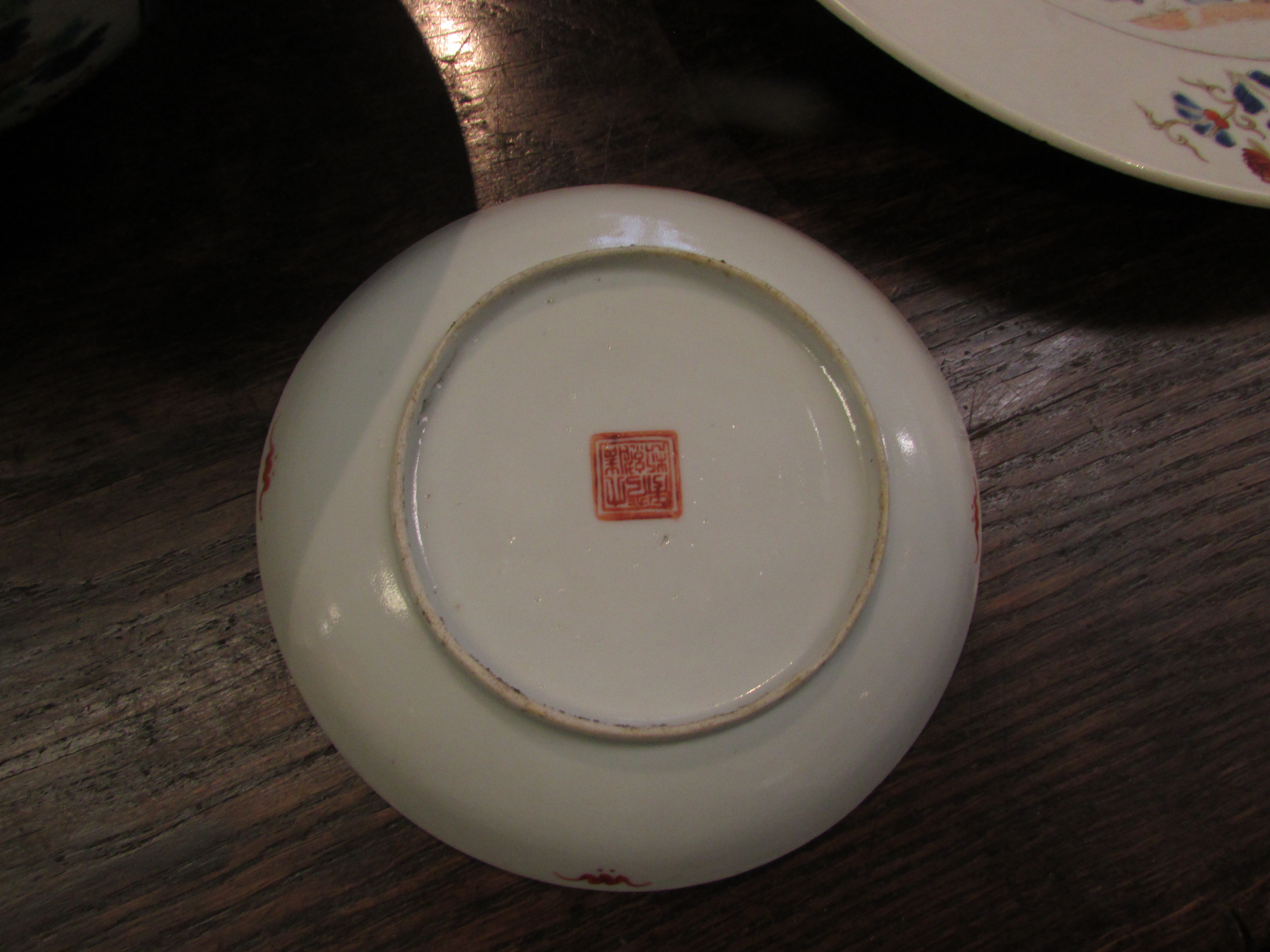 Three items of Chinese porcelain - a circular dish enamelled in blue and red with birds in flowering - Image 6 of 11