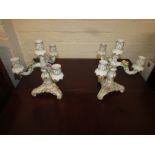 Pair of Porzellan Manufaktur Plaue floral encrusted candle holders, three-branch with central