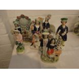 Six 19th century Staffordshire flatback pottery figures - boy with dog, children with hoop and