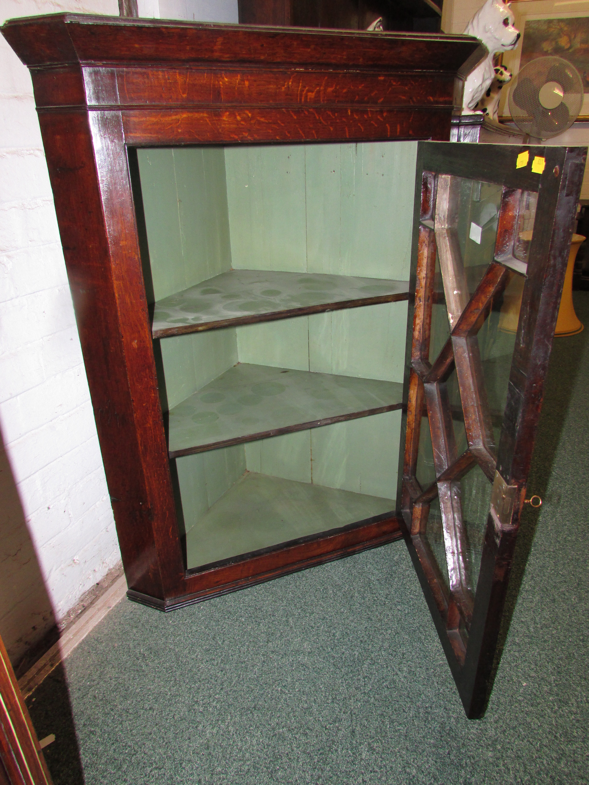 George III oak corner wall cupboard with geometrically glazed door with two shelves within, key in - Image 3 of 4