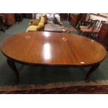 Victorian D-end wind-out extending mahogany dining table on cabriole legs with pad feet and brown