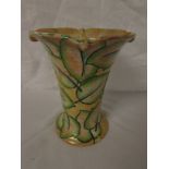 A Burleigh vase signed Bennett, yellow painted with green stylized leaves, of flared form with