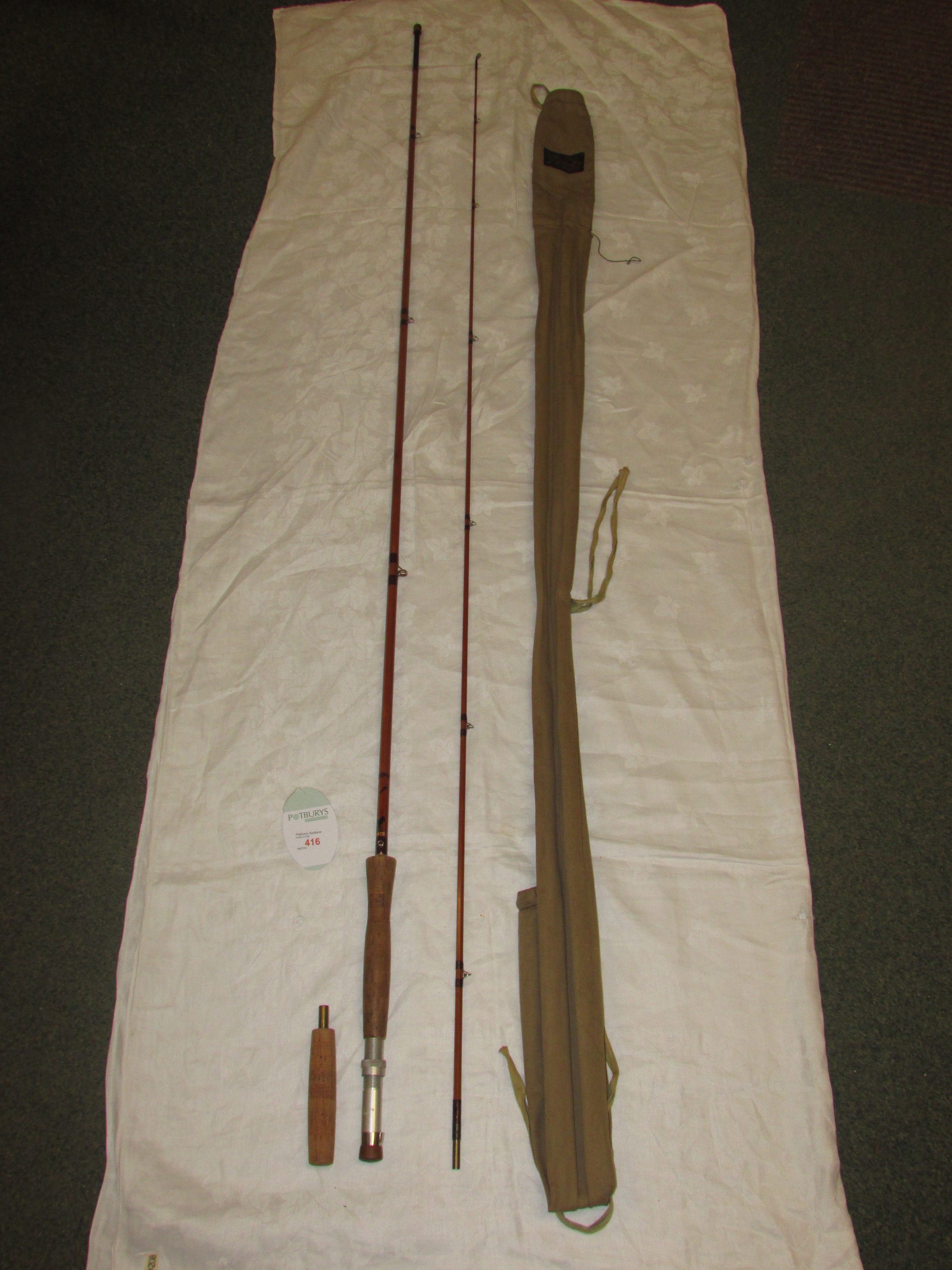 J S Sharpe 9.5' two-piece Scottie impregnated fishing rod with cork handle, 291cm, with canvas bag