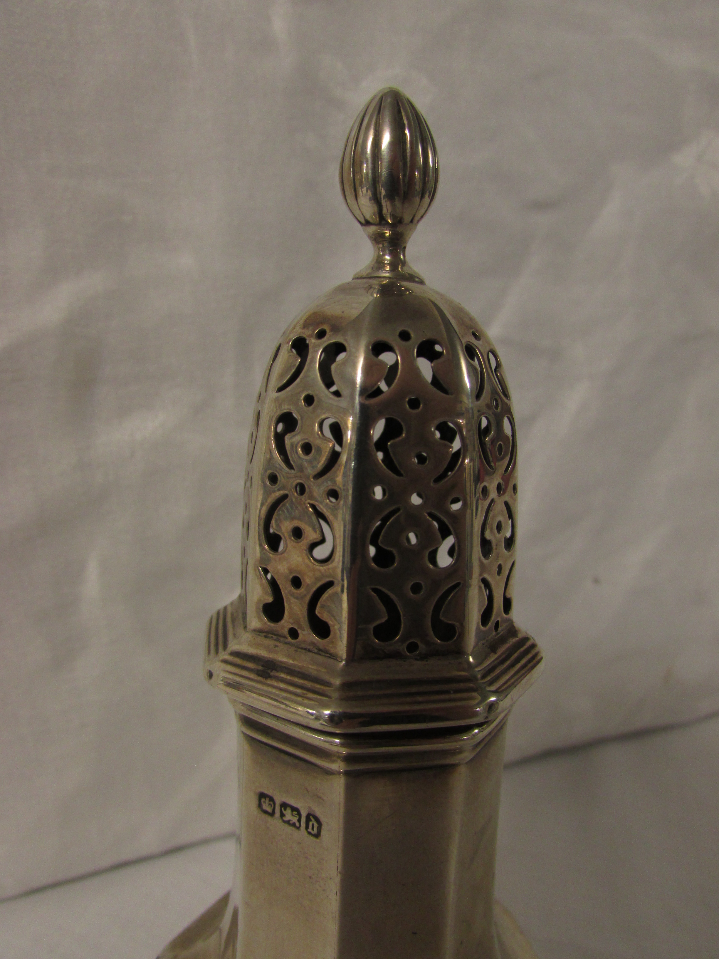 A late Victorian silver sugar caster of octagonal baluster form, marks for Sheffield, 1896, - Image 2 of 3