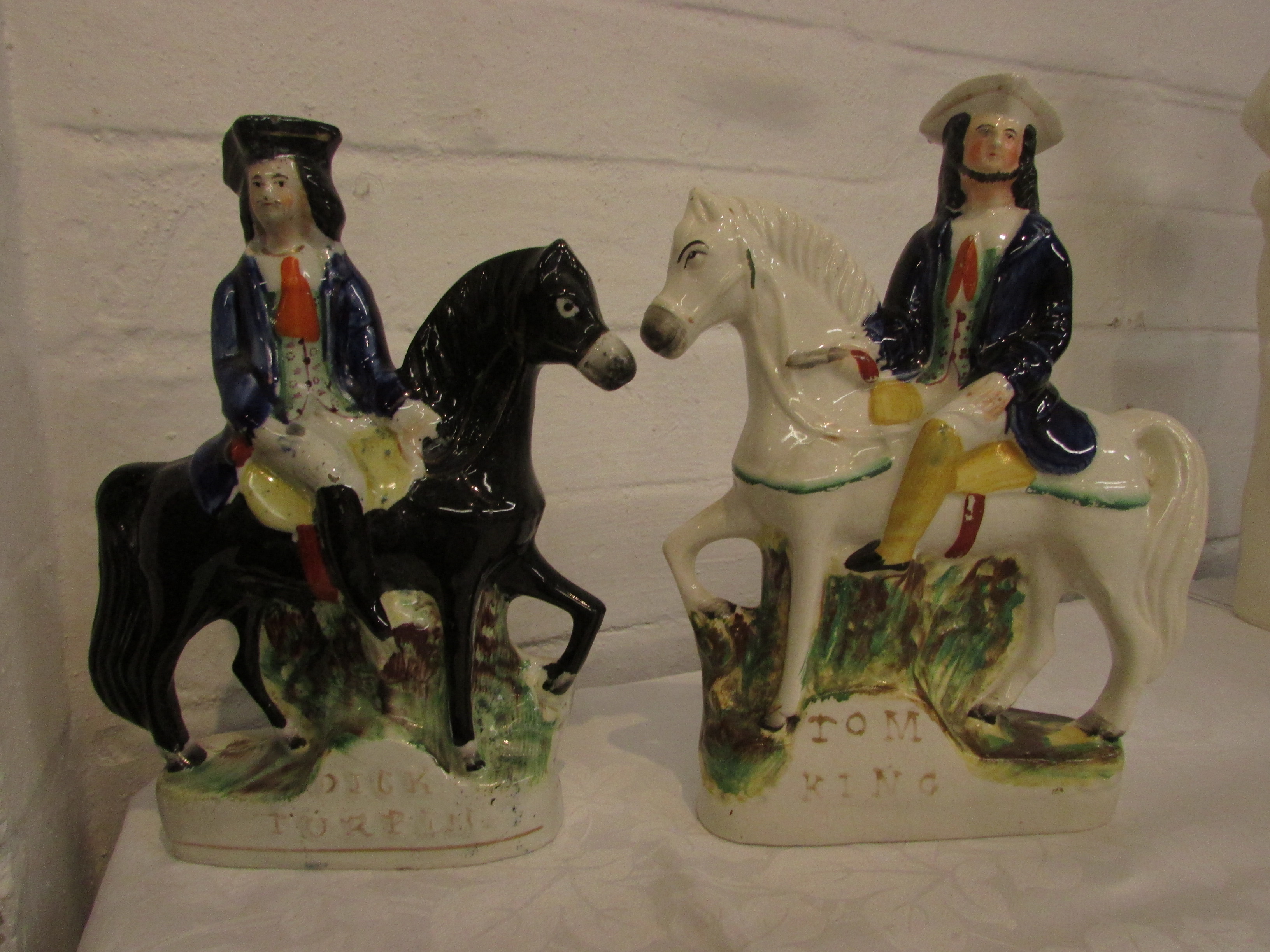 Two corresponding 19th century Staffordshire pottery flatback figures - Dick Turpin on Black Bess (