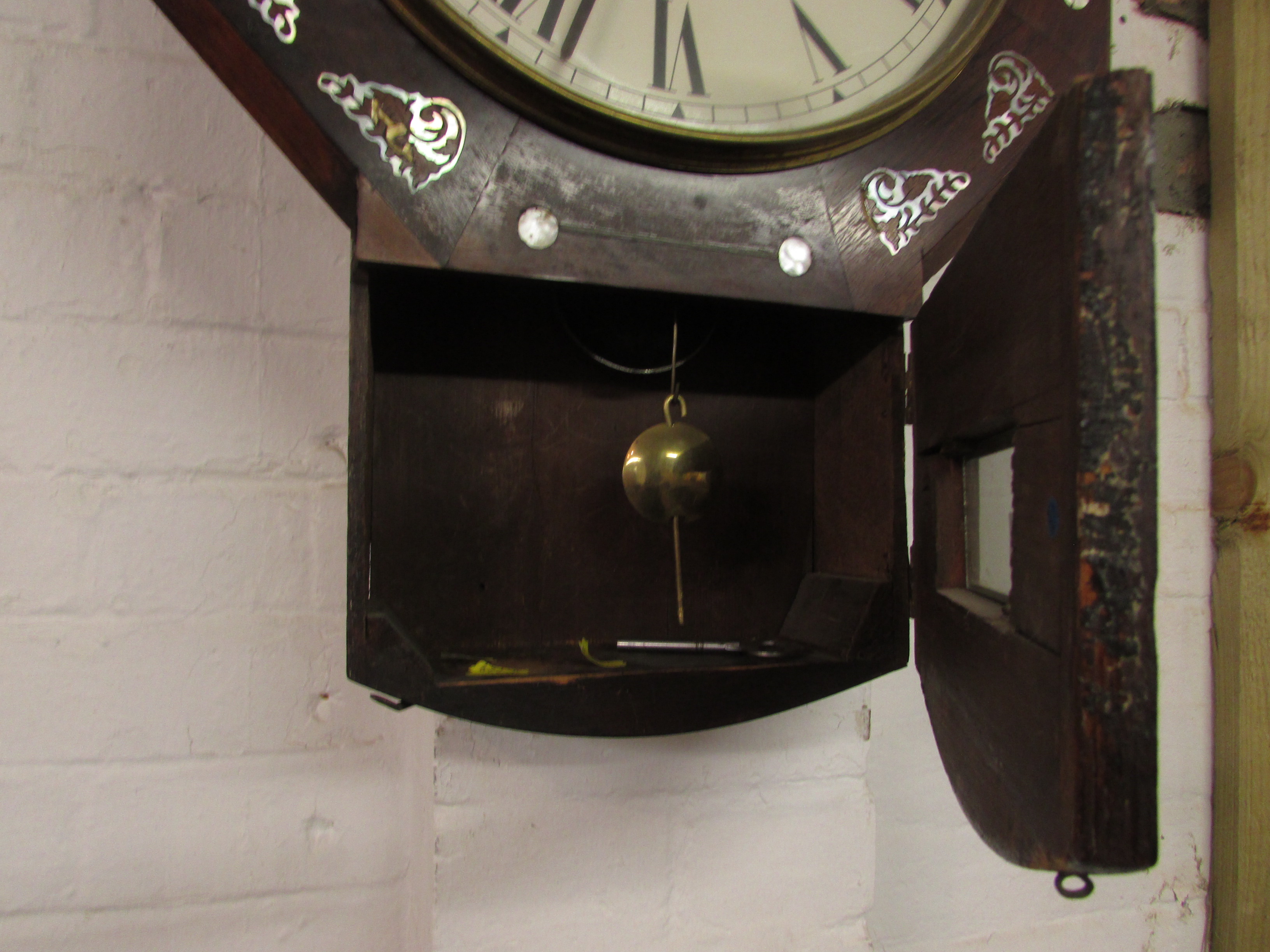A Victorian eight-day striking wall clock. The octagonal case is of rosewood veneer and inlaid - Image 4 of 4