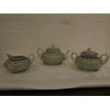 Chinese three-part tea set comprising teapot, lidded sugar bowl and milk jug, thick white