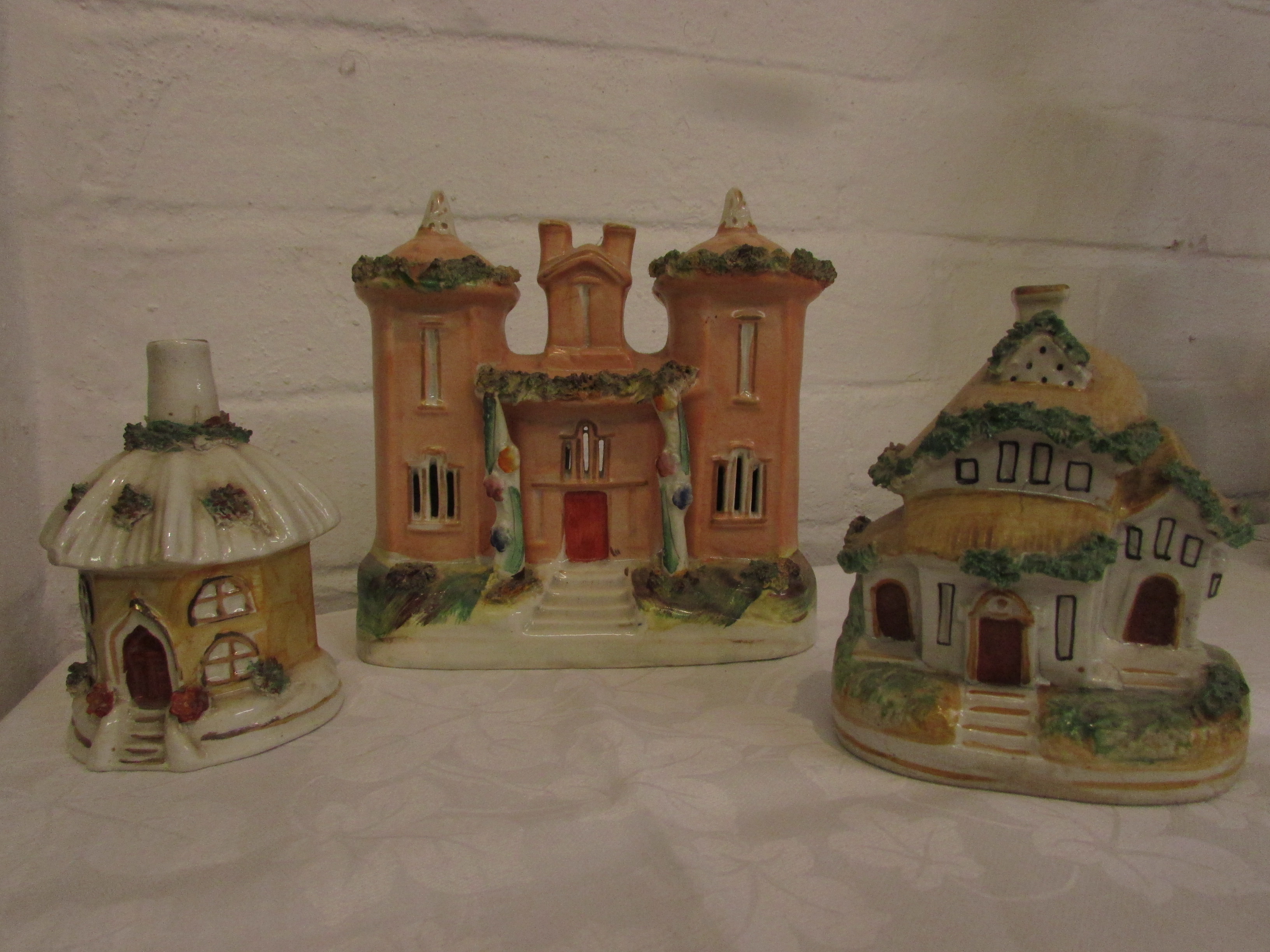 19th century Staffordshire pottery turreted castle pastille burner (height 15.5cm), a