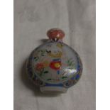 Chinese glass snuff bottle enamelled with boys in garden and foliate scrolls, height 6.3cm